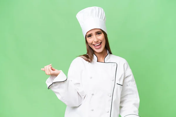 Giovane Chef Donna Caucasica Sfondo Isolato Facendo Gesto Chitarra — Foto Stock