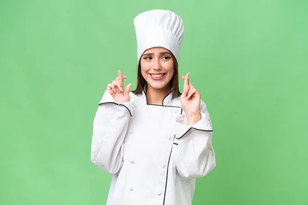 Giovane Chef Donna Caucasica Sfondo Isolato Con Dita Incrociate — Foto Stock