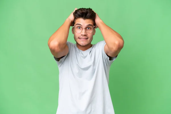 stock image Young caucasian handsome man over isolated background doing nervous gesture