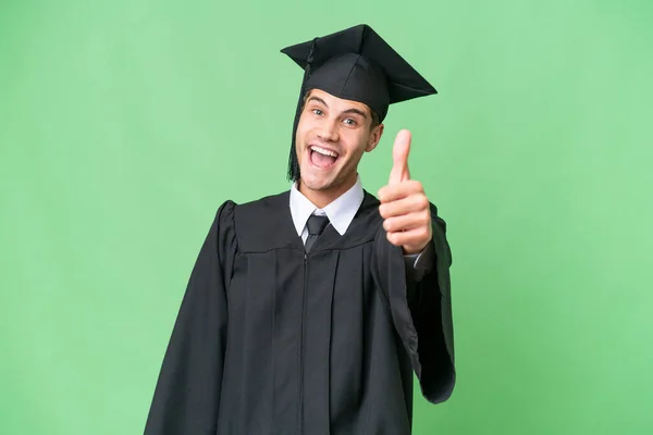 Jovem Universitário Graduado Caucasiano Homem Sobre Fundo Isolado Com Polegares — Fotografia de Stock