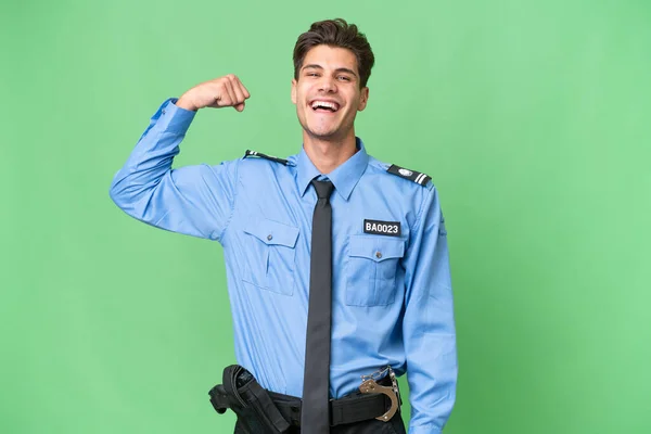 Giovane Poliziotto Sfondo Isolato Facendo Gesto Forte — Foto Stock