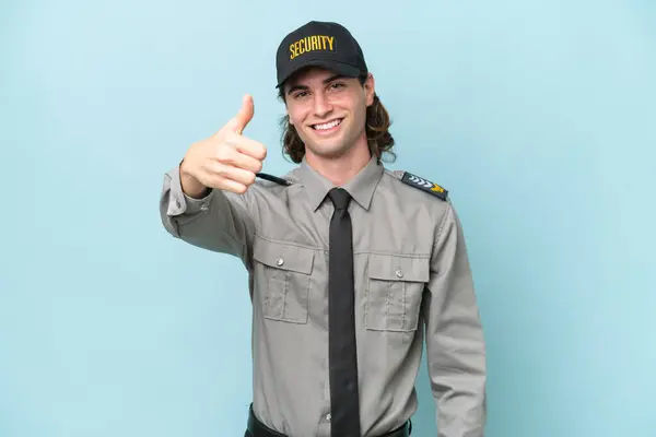 Young Safeguard Man Isolated Blue Background Thumbs Because Something Good — Stock Photo, Image