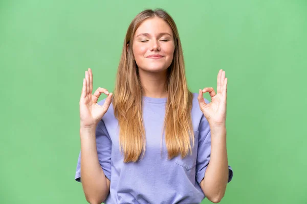 Young Beautiful Woman Isolated Background Zen Pose — Φωτογραφία Αρχείου