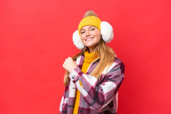 Young Beautiful Woman Wearing Winter Muffs Isolated Red Background Celebrating — Foto Stock