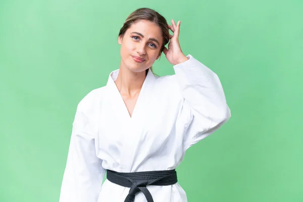 Joven Uruguaya Haciendo Karate Sobre Fondo Aislado Teniendo Dudas — Foto de Stock