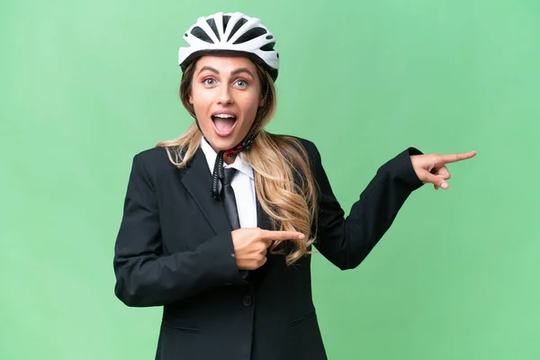 Business Uruguayan Woman Wearing Helmet Biker Isolated Background Surprised Pointing — Stock Photo, Image
