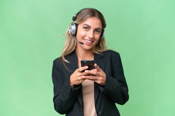 Telemarketer Pretty Uruguayan Woman Working Headset Isolated Background Sending Message — Stock Photo, Image