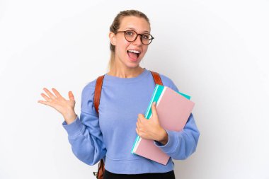 Young student caucasian woman isolated on white background with shocked facial expression