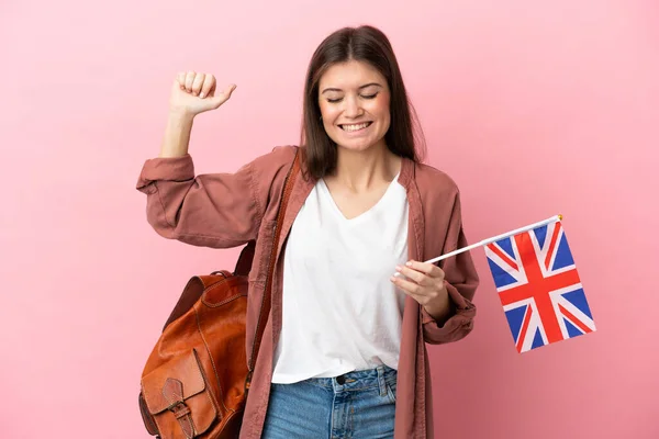 Young Caucasian Woman Holding United Kingdom Flag Isolated Pink Background — Fotografia de Stock