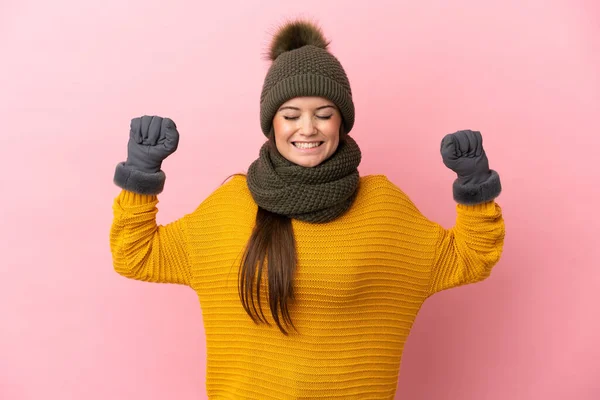Young Caucasian Girl Winter Hat Isolated Pink Background Doing Strong — Stock Photo, Image