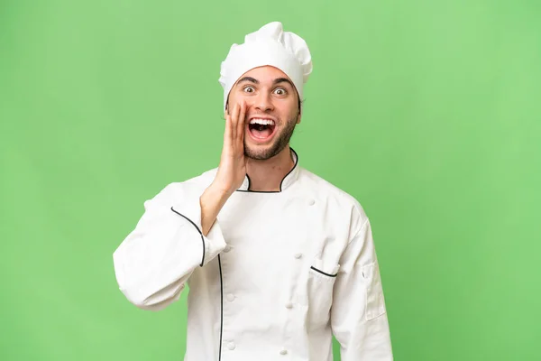 Jonge Knappe Chef Kok Man Geïsoleerde Achtergrond Met Verrassing Geschokte — Stockfoto