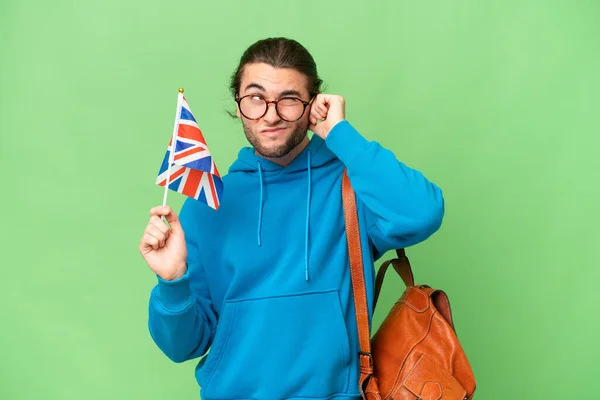 Ung Stilig Man Som Håller Brittisk Flagga Över Isolerade Bakgrund — Stockfoto