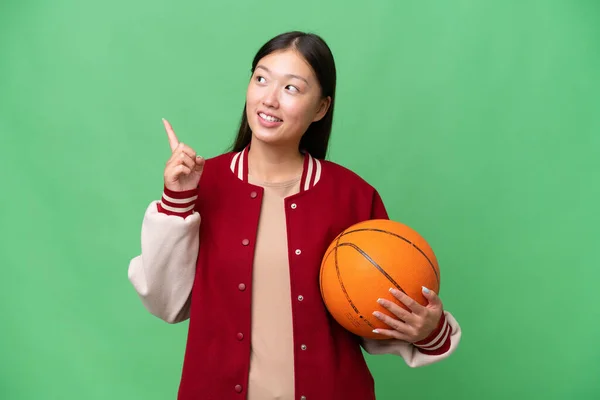 Young Basketball Player Asian Woman Isolated Background Pointing Great Idea — Foto Stock