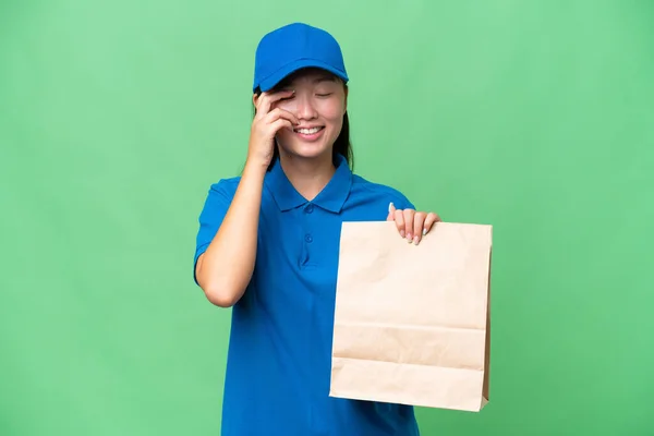 Young Asian Woman Taking Bag Takeaway Food Isolated Background Laughing —  Fotos de Stock