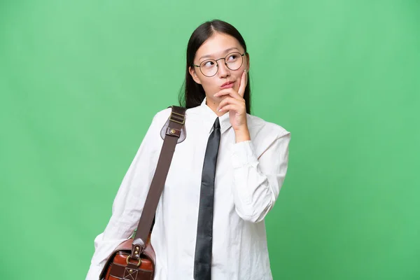 Young Asian Business Woman Isolated Background Having Doubts Confuse Face — Fotografia de Stock
