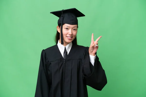 Jovem Universidade Graduado Ásia Mulher Sobre Isolado Fundo Sorrindo Mostrando — Fotografia de Stock