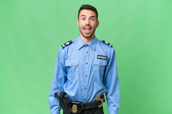 Junger Polizeikaukasier Mit Überraschendem Gesichtsausdruck Über Isolierten Hintergrund — Stockfoto