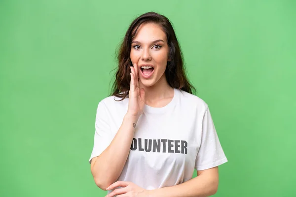 Joven Voluntaria Caucásica Sobre Fondo Aislado Con Sorpresa Expresión Facial —  Fotos de Stock