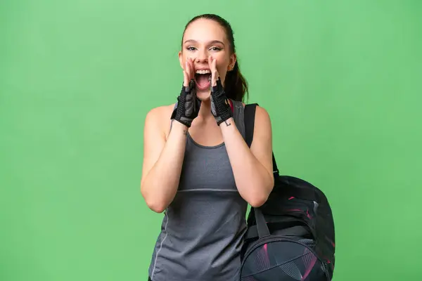 Young Sport Woman Sport Bag Isolated Background Shouting Announcing Something — Stock Photo, Image