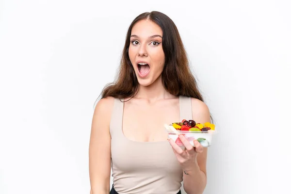 Young Caucasian Woman Holding Bowl Fruit Isolated White Background Surprise — Stock Photo, Image