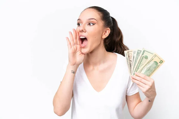 Joven Mujer Caucásica Tomando Montón Dinero Aislado Sobre Fondo Blanco — Foto de Stock