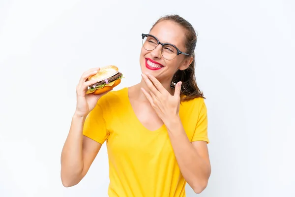 Young Caucasian Woman Holding Burger Isolated White Background Looking While — Photo