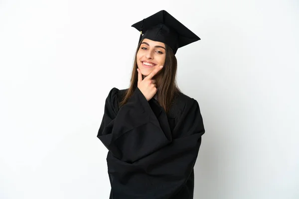 Genç Üniversite Mezunu Beyaz Arka Planda Mutlu Gülümsüyor — Stok fotoğraf