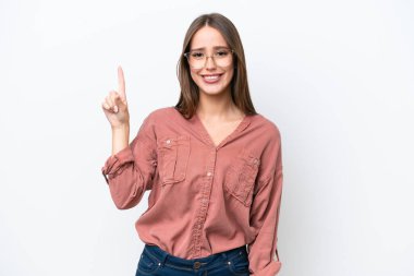 Young pretty caucasian woman isolated on white background pointing up a great idea