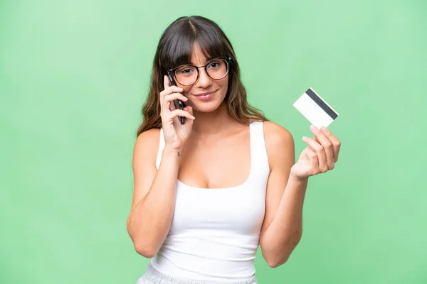 Young Caucasian Woman Isolated Background Keeping Conversation Mobile Phone Holding — Stock Photo, Image