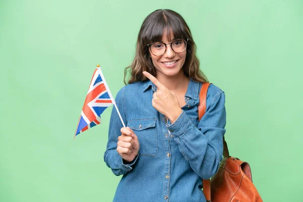 Young Caucasian Woman Holding United Kingdom Flag Isolated Background Pointing — Foto de Stock