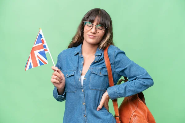 Jovem Caucasiana Segurando Uma Bandeira Reino Unido Sobre Fundo Isolado — Fotografia de Stock