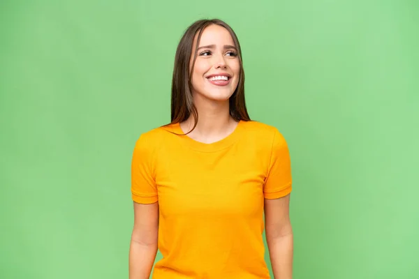 stock image Young pretty caucasian woman over isolated background laughing