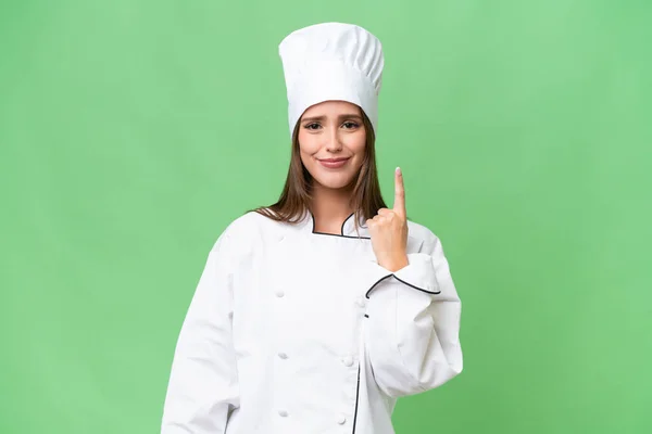 Young Chef Caucasian Woman Isolated Background Pointing Index Finger Great —  Fotos de Stock