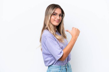 Young Uruguayan woman isolated on white background proud and self-satisfied