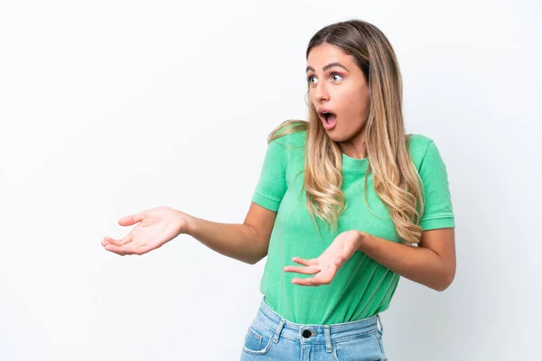 stock image Young Uruguayan woman isolated on white background with surprise expression while looking side