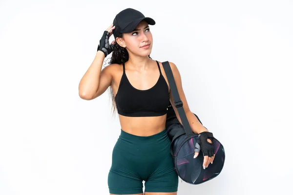 Young Sport Woman Sport Bag Isolated White Background Having Doubts — Φωτογραφία Αρχείου