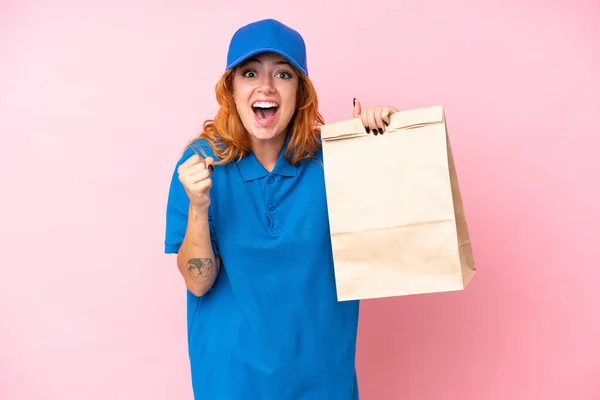 Young Caucasian Woman Taking Bag Takeaway Food Isolated Pink Background — Stock Photo, Image
