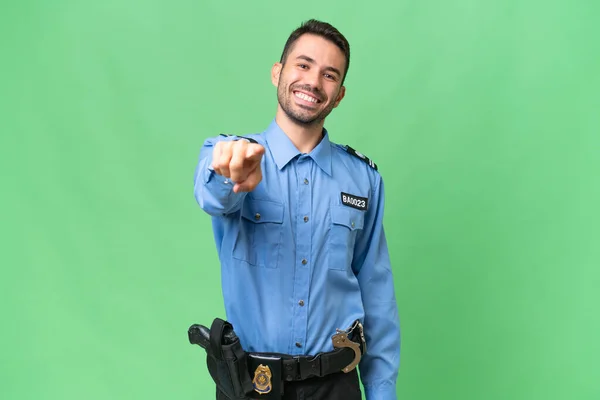 Jovem Polícia Caucasiano Homem Sobre Isolado Fundo Apontando Frente Com — Fotografia de Stock