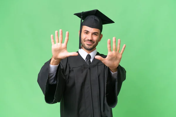 Jovem Universitário Graduado Homem Sobre Isolado Fundo Contando Dez Com — Fotografia de Stock