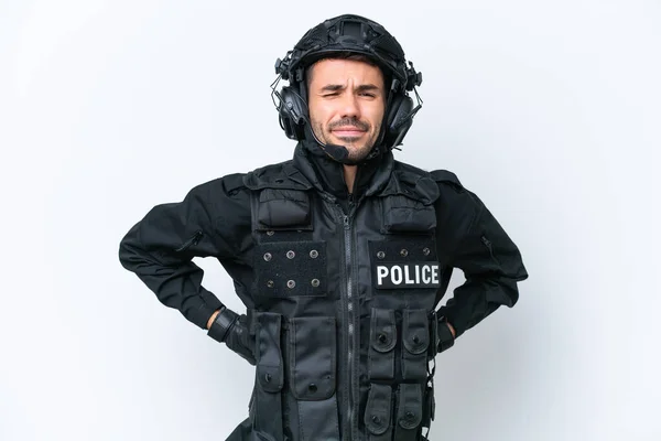 stock image Young caucasian SWAT man isolated on white background suffering from backache for having made an effort