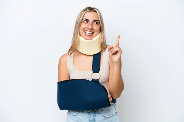 Woman Broken Arm Wearing Sling Isolated White Background Pointing Great —  Fotos de Stock