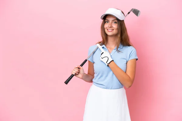 Young Golfer Player Man Isolated Pink Background Pointing Side Present — Stok fotoğraf