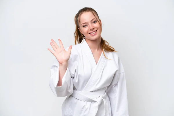 Joven Chica Caucásica Haciendo Karate Aislado Sobre Fondo Blanco Contando — Foto de Stock