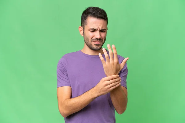 stock image Young handsome caucasian man over isolated background suffering from pain in hands