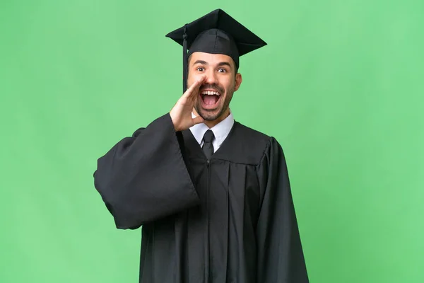 Young University Graduate Man Isolated Background Surprise Shocked Facial Expression — Stock Photo, Image