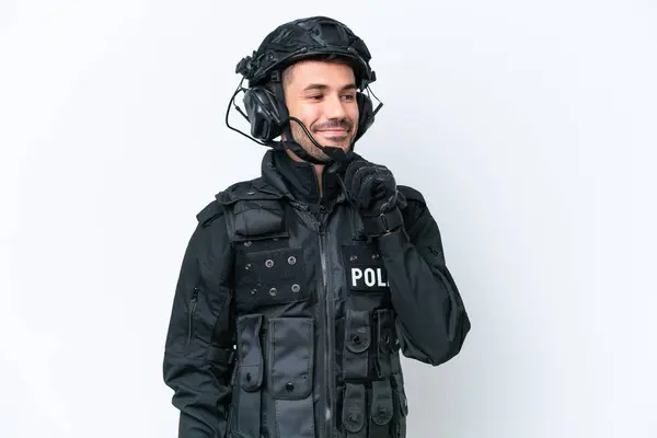 Young Caucasian Swat Man Isolated White Background Looking Side — Stock Photo, Image