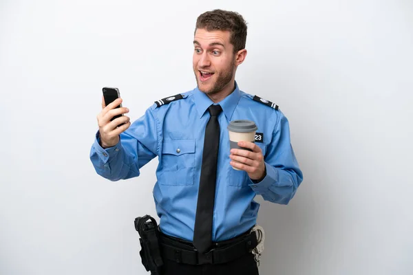 Young Police Caucasian Man Isolated White Background Holding Coffee Take — kuvapankkivalokuva