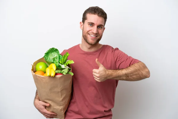 Young Caucasian Man Holding Grocery Shopping Bag Isolated White Background — Stock Photo, Image