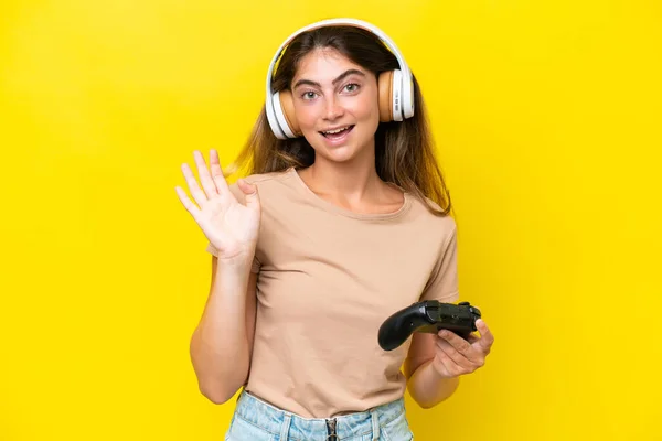 Young Caucasian Woman Playing Video Game Controller Isolated Yellow Background — Stock Photo, Image