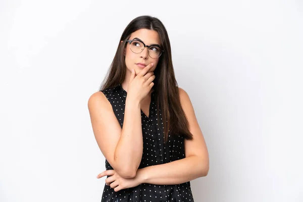 stock image Young Brazilian woman isolated on white background having doubts and with confuse face expression